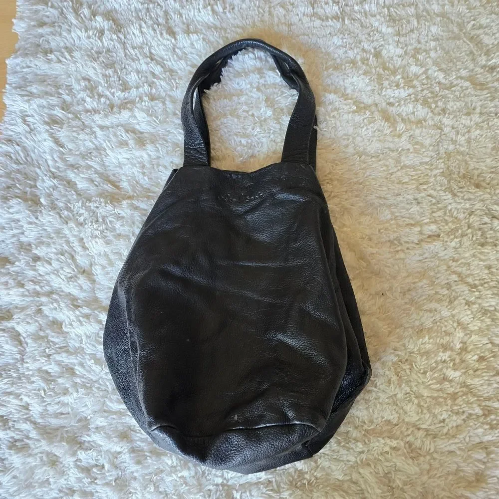 Neta Sade black leather‎ hobo purse.